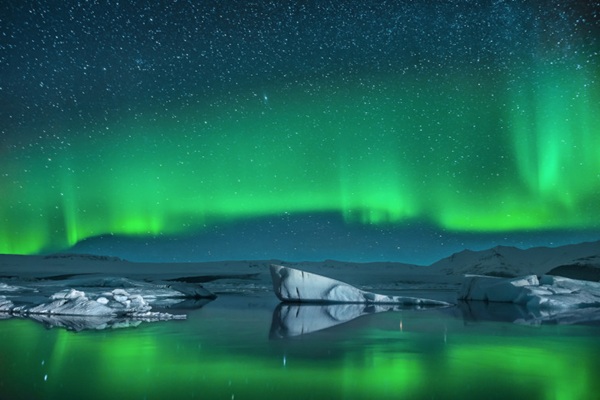 icebergs-under-the-northern-lights-greenland-secret-atlas